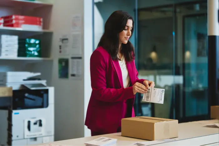 Applying label to shipping box