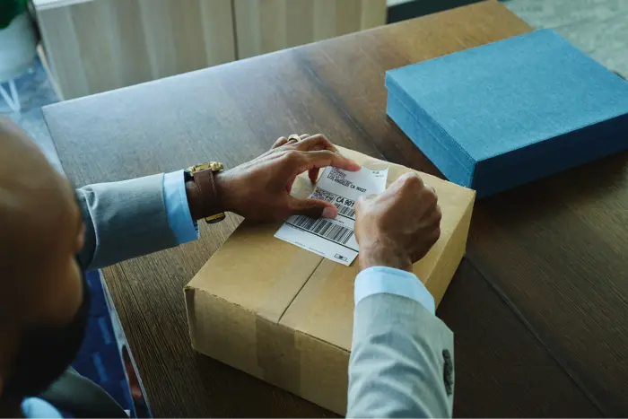 Applying a shipping label to a package